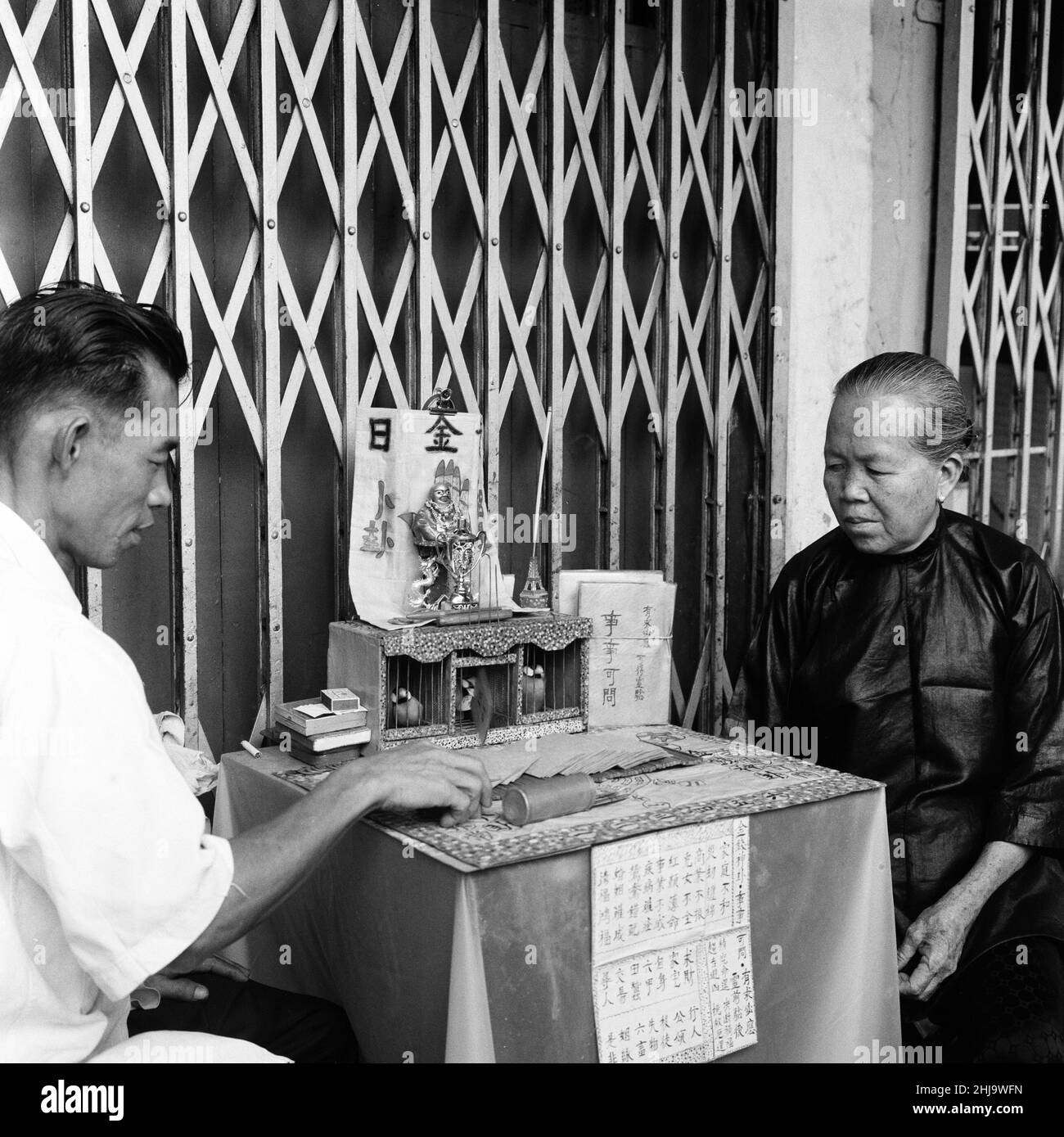 Scenes in Chinatown, Singapore. 6th February 1962. Stock Photo