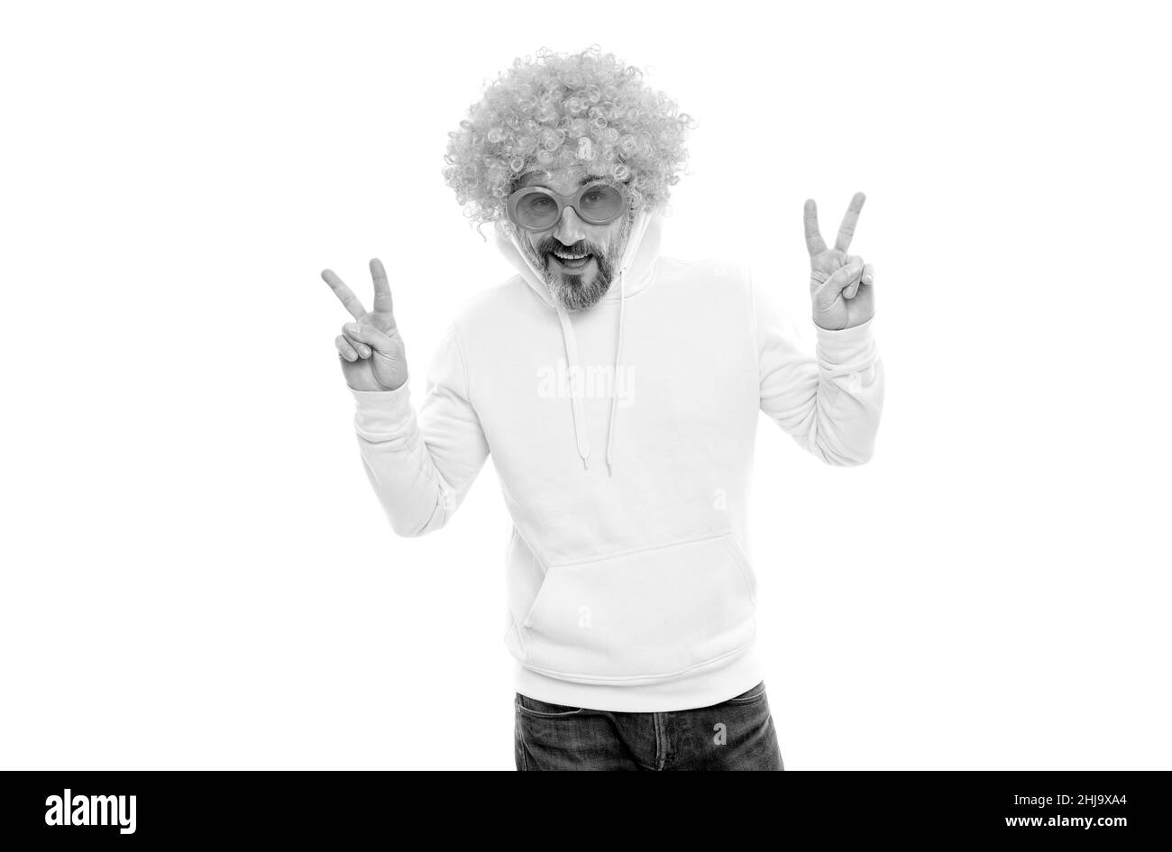 Just cool dude. Crazy man show peace signs. Cool fashion. Nerdy look. Funky wig hair Stock Photo