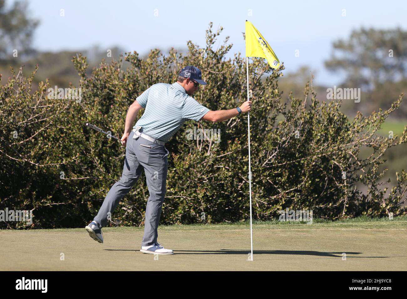 San Diego, California, USA. 27th Jan, 2022. Adam Schenk adjusts the pin ...