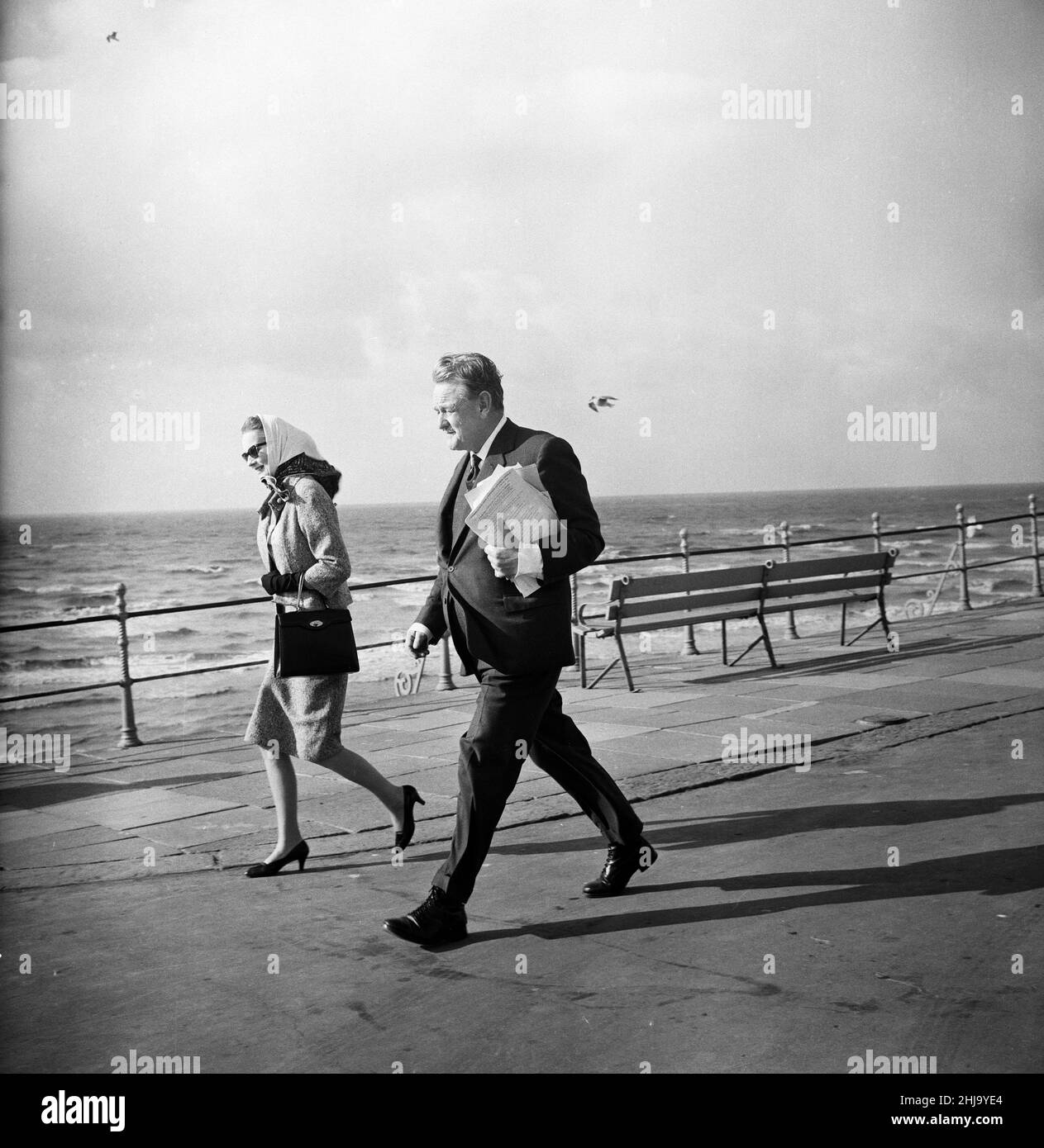 The Conservative Party Conference in Blackpool. Quintin Hogg, Lord Hailsham, walks along the front with Lady Poole. 11th October 1963. Stock Photo