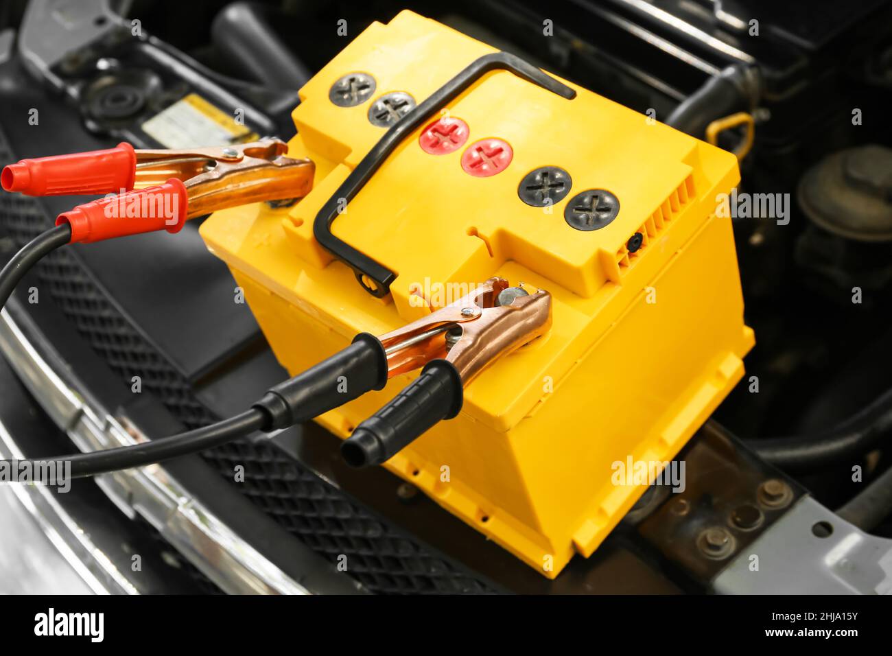 Charging of modern car battery Stock Photo Alamy