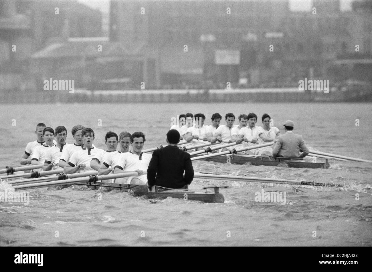 Oxford verses Cambridge Boat Race, on The River Thames, London, 23rd March 1963  The 109th Boat Race took place on 23 March 1963. Held annually, the event is a side-by-side rowing race between crews from the Universities of Oxford and Cambridge along the River Thames. The race, umpired by Gerald Ellison, the Bishop of Chester, was won by Oxford with a winning margin of five lengths.  Picture taken 23rd March 1963 Stock Photo