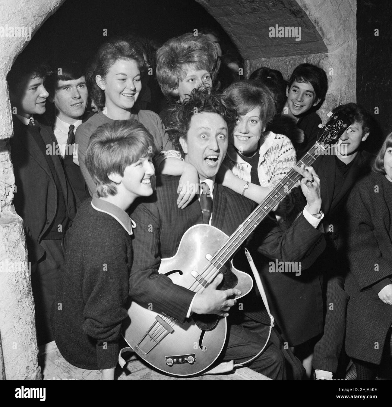 Comedian Ken Dodd was made the first honorary life member of Liverpool Cavern Club. Ken mimes his way through one of the top pop numbers watched by teenagers.  24th January 1964. Stock Photo
