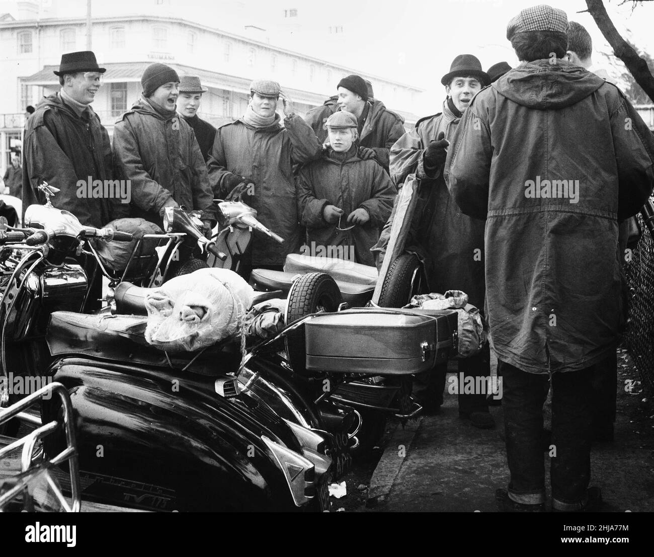 Mods gather on the sea front at Clacton on their scooters over the 1964 Easter weekend, which was marked by several scuffles between Mods and Rockers at the Essex seaside resort. 30th March 1964 Stock Photo