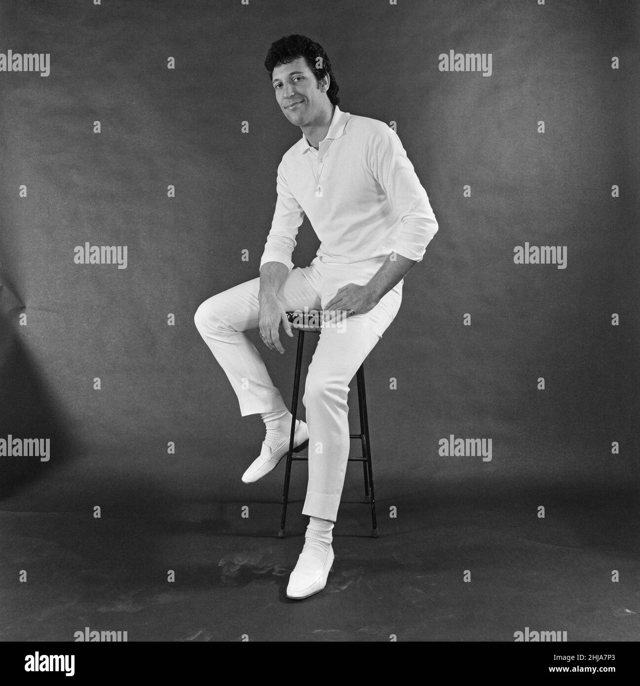 Tom Jones, singer from Wales. Also Sir Tom Jones.Born Thomas John Woodward on 7th June 1940 in Pontypridd, Glamorgan, South Wales.  At this time in Tom's career, he had just released his first solo single, 'Chills and Fever' in August 1964.  But in 1965, Tom became a household name with his major hit 'It's Not Unusual'.  Other hits followed in the the 1960s such as What's New Pussycat, The Green Green Grass of Home, and Delilah.  Picture taken 24th September 1964 Stock Photo