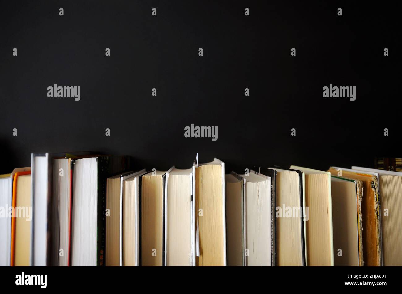 Book compositions on a dark background. Minimal design for the cover