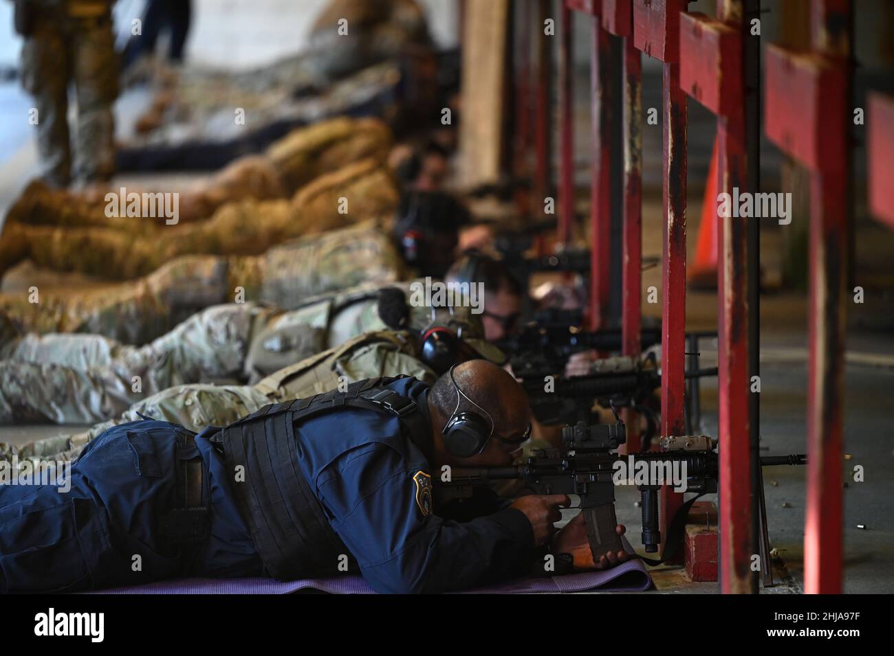 U.S. Air Force Defenders prepare to fire M4 rifles during an Air Force