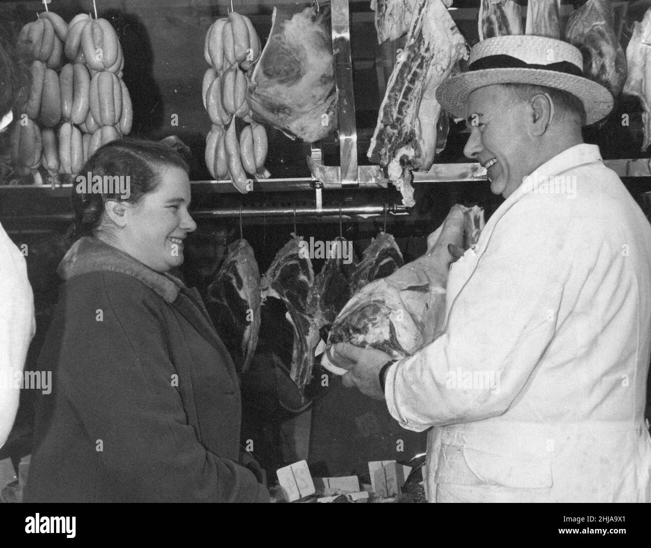 Woman at Butchers Shop, January 1962. Stock Photo