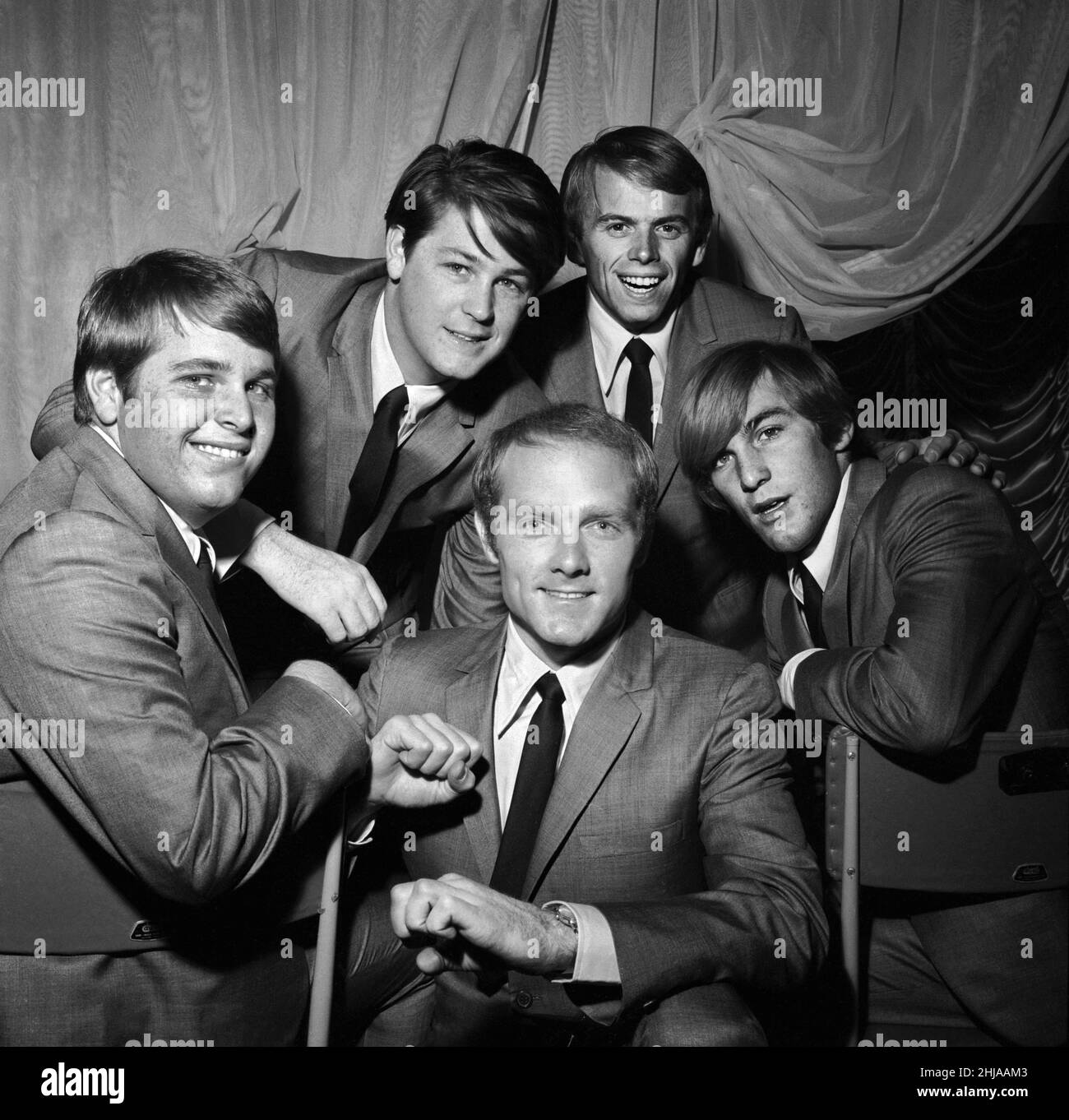 American pop group The Beach Boys at a photocall held at EMI House in Manchester Square.They are back row left to right: Brian Wilson and Al jardine. Front row left to right: Carl Wilson, Mike Love and Dennis Wilson. 2nd November 1964. Stock Photo