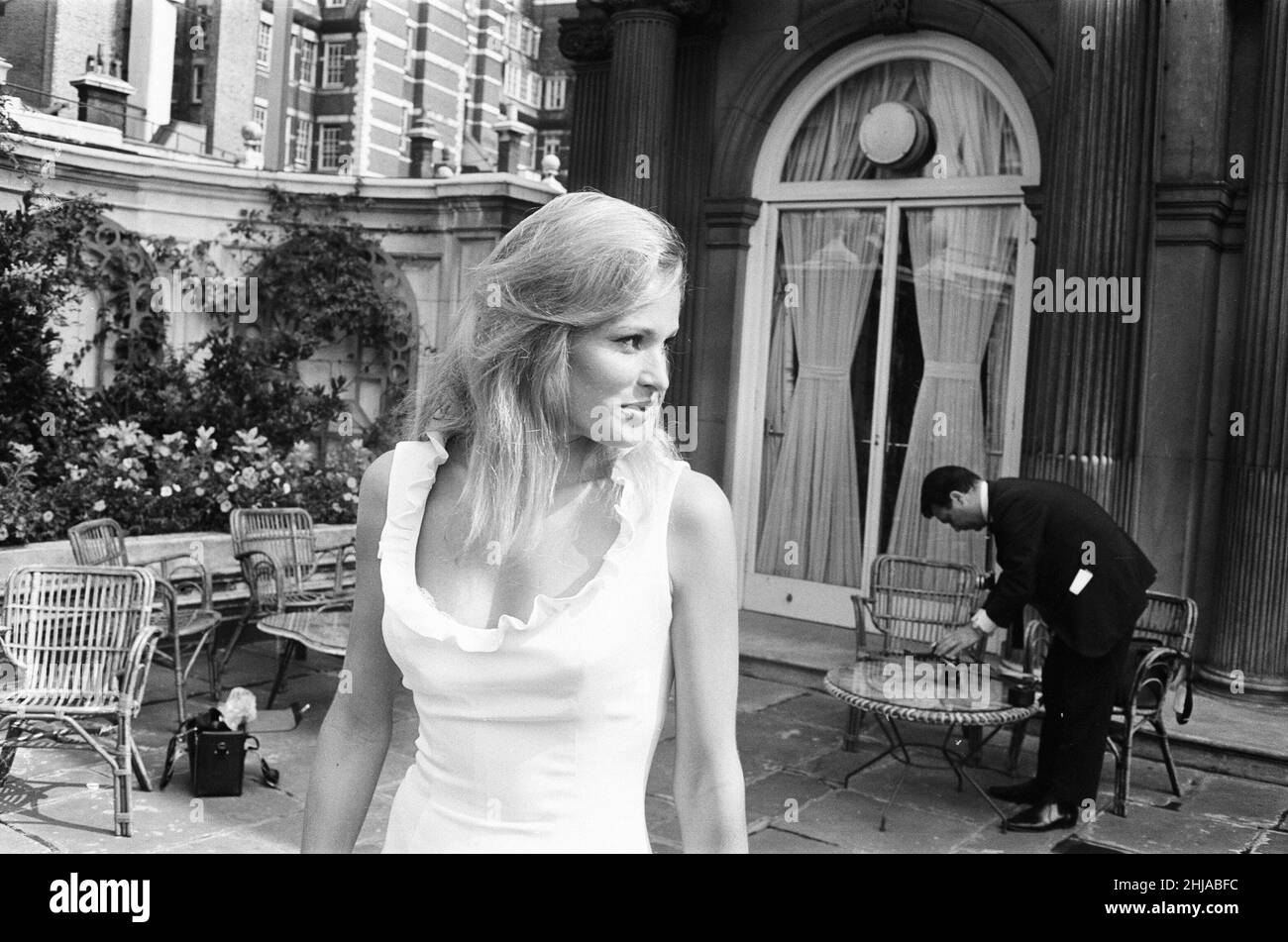 Ursula Andress, swiss actress, photo-call for 1965 film SHE, based on She : A History of Adventure, a novel by H. Rider Haggard, pictured in Park Lane, London, Wednesday 12th August 1964. Ursula Andress plays Ayesha an immortal queen and high priestess.  SIDE NOTE : Ursula Andress starred as Honey Ryder in James Bond film Dr. No, by Ian Fleming, photo-call taken on day of news of his death. Stock Photo
