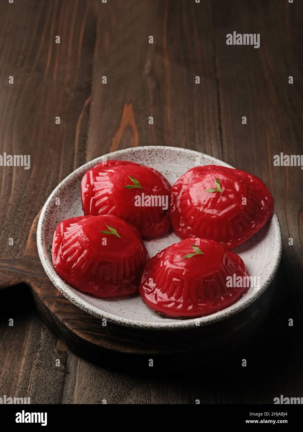 Ang Kue (Kue Ku) or Kue Thok, steamed Chinese pastry of glutinous rice