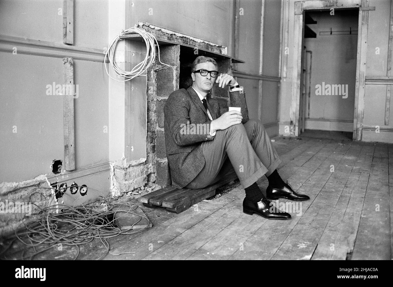 Michael Caine on the set of 'The Ipcress File'. 21st September 1964. Stock Photo