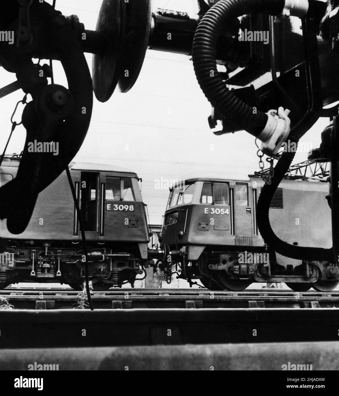 Two new British Rail Class 83  express  electric locomotive trains,  built by English Electric at Vulcan Foundry, Newton-le-Willows for the newly electrified West Coast Main Line between Birmingham and Liverpool.  Circa January 1963. Stock Photo