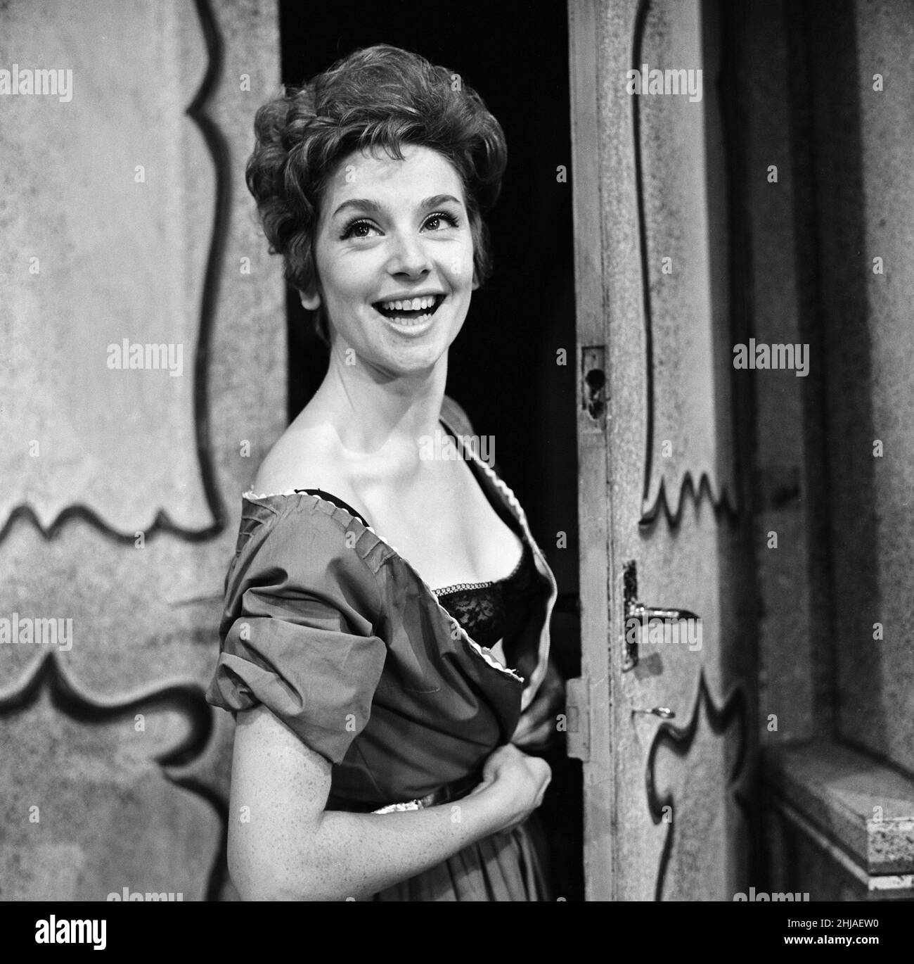 Actress Barbara Mullaney (later known as Barbara Knox) suffered a wardrobe malfunction on stage during a performance of 'A Shot in the Arm' at Oldham Rep when her zip broke. Theatregoers will not have a repeat performance tonight - she will be wearing a different dress, with buttons. 20th September 1964. Stock Photo