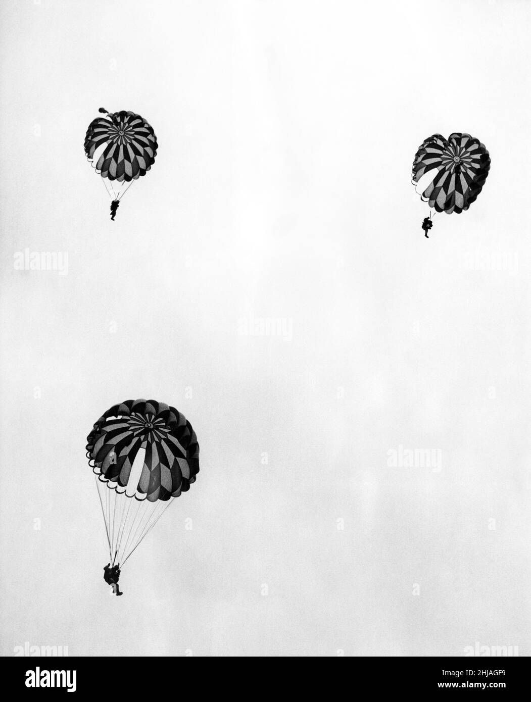 Sky Divers, the daredevil Special Air Service's parachute team jumped 2500 feet to a tiny target at the Tyneside Summer Exhibition at the Exhibition Park, Newcastle. 22nd August 1963. Stock Photo