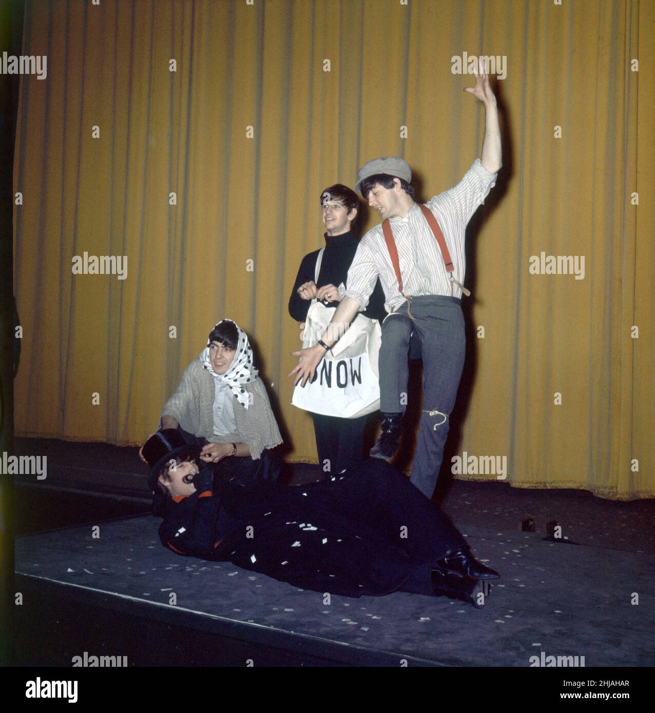 The Beatles in costume seen here rehearsing on stage for their Christmas Show at the Astoria Finsbury Park 23rd December 1963 *** Local Caption *** Paul McCartneyRingo Starr George Harrison John Lennon Stock Photo