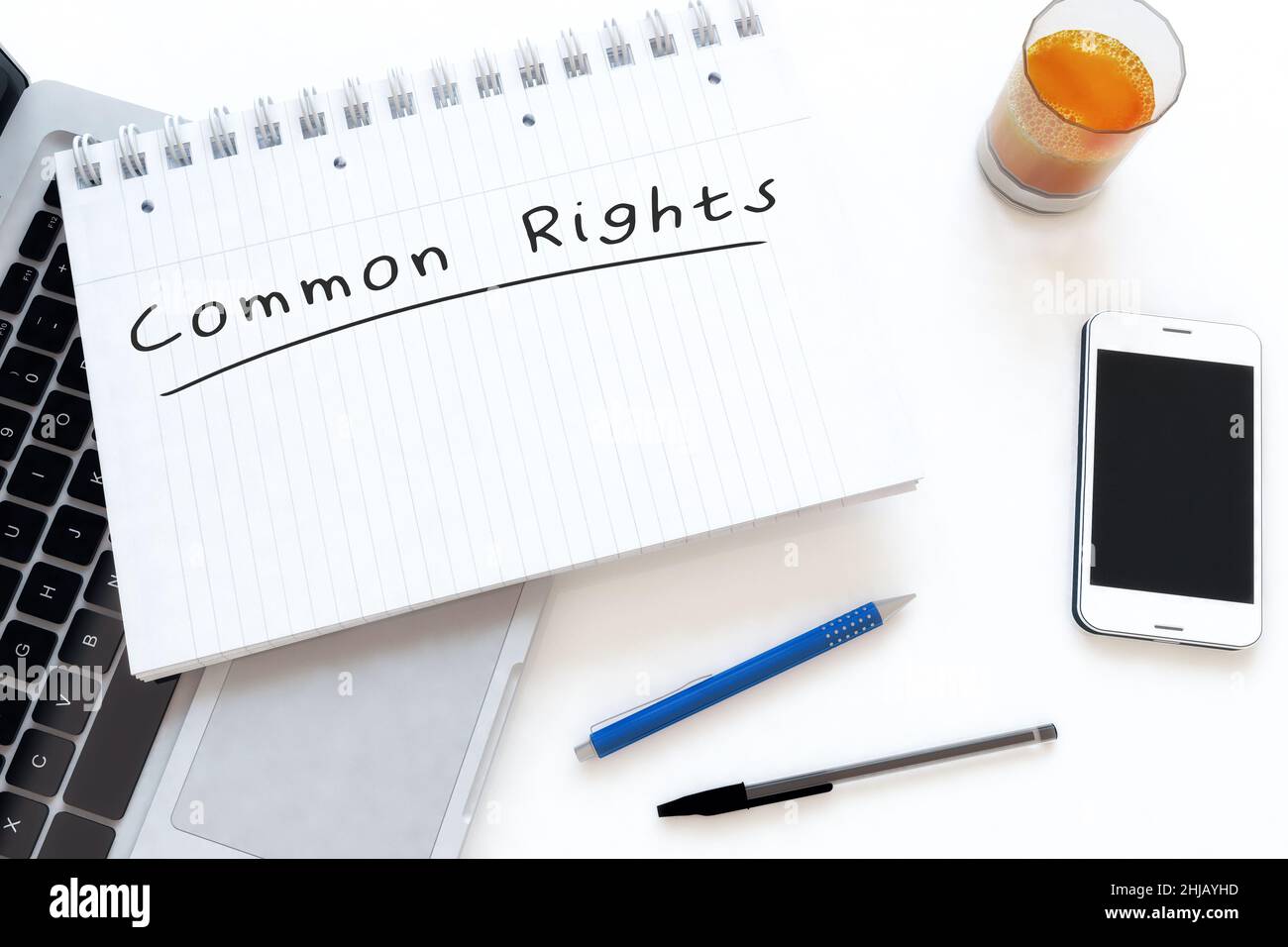 Common Rights - handwritten text in a notebook on a desk - 3d render ...