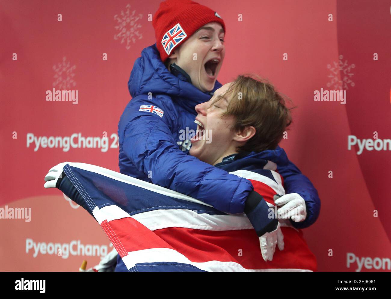 File photo dated 17-02-2018 of Great Britain's Lizzy Yarnold (right) celebrates winning gold in the Women's Skeleton with bronze medallist Laura Deas. 5 - record British medal tally at the 2018 Games in Pyeongchang - gold for Lizzy Yarnold in skeleton and bronze medals for Laura Deas in the same event, Dominic Parsons in the men’s equivalent, Izzy Atkin in slopestyle skiing and Billy Morgan in snowboard big air. Issue date: Friday January 28, 2022. Stock Photo