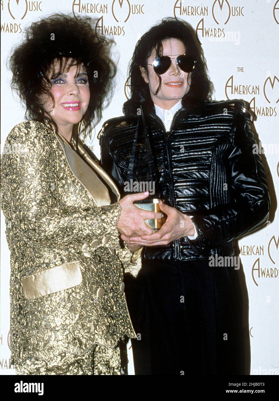 Michael Jackson 1993 American Music Awards with Elizabeth Taylor Credit: Ron Wolfson / Rock Negatives / MediaPunch Stock Photo