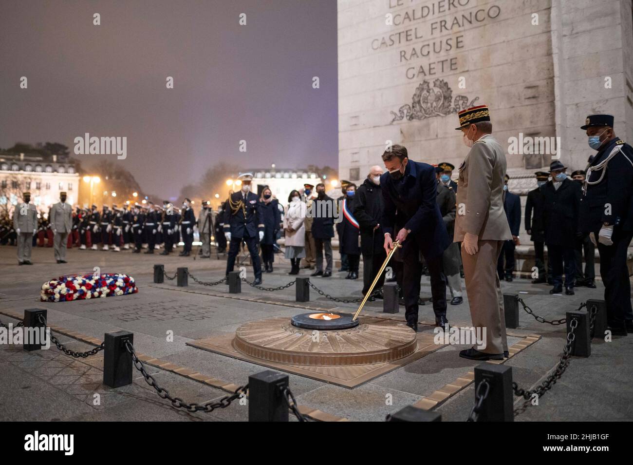 Paris, France. 27th Jan, 2022. French President Emmanuel Macron with Auschwitz concentration camp survivor Esther Senot and Bergen-Belsen concentration camp survivor Victor Perahia at the Tomb of the Unknown Soldier under the Arc de Triomphe during a ceremony to mark the International Holocaust Remembrance Day, on January 27, 2022 in Paris. Photo by Eliot Blondet/ABACAPRESS.COM Credit: Abaca Press/Alamy Live News Stock Photo