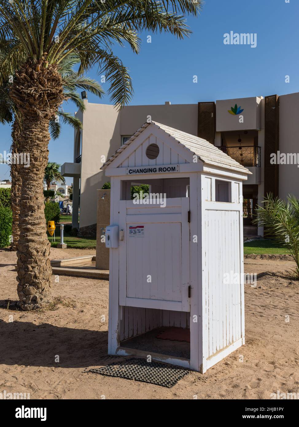 Hurghada, Egypt - June 03, 2021: Wooden dressing room on the sandy shore of the sea in Labranda Club Makadi Bay, which one of Egypt beautiful Red Sea Stock Photo