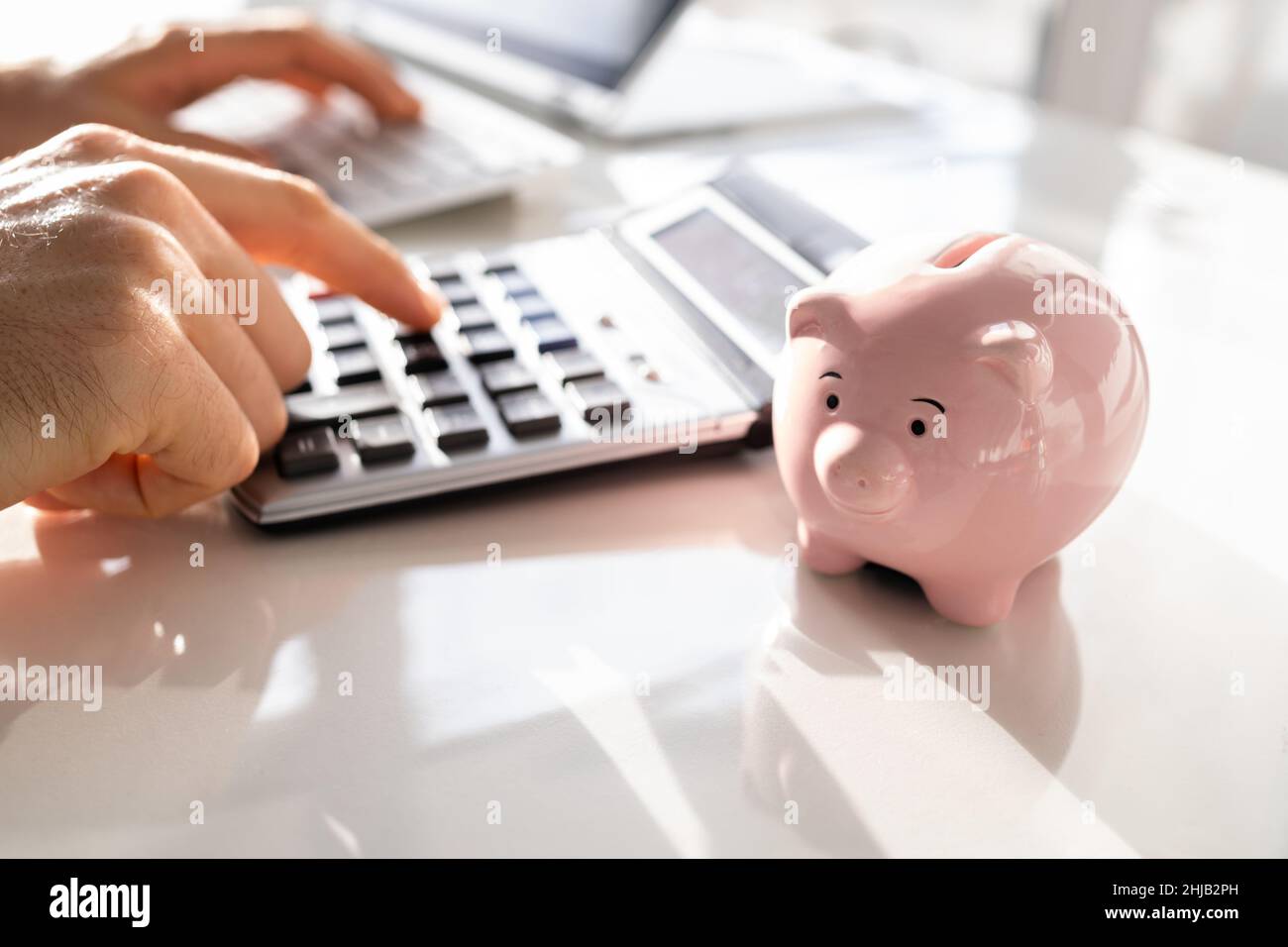 Businessman Doing Professional Accounting Using Calculator. Invoice Document Stock Photo