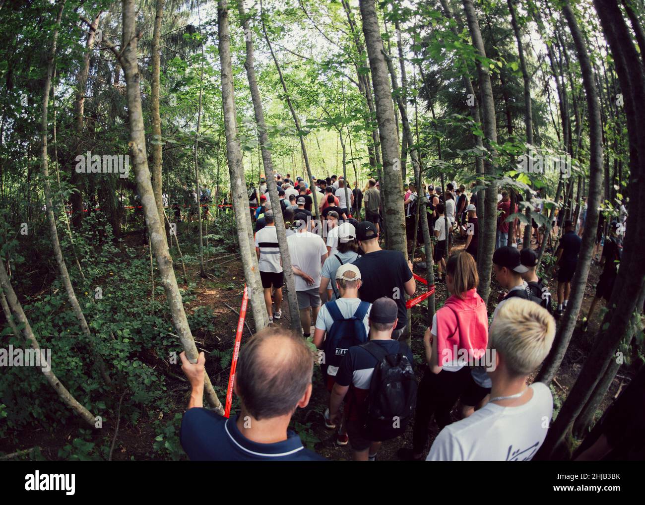 Group of people watching the Disc golf championships in Sipoo, Finland