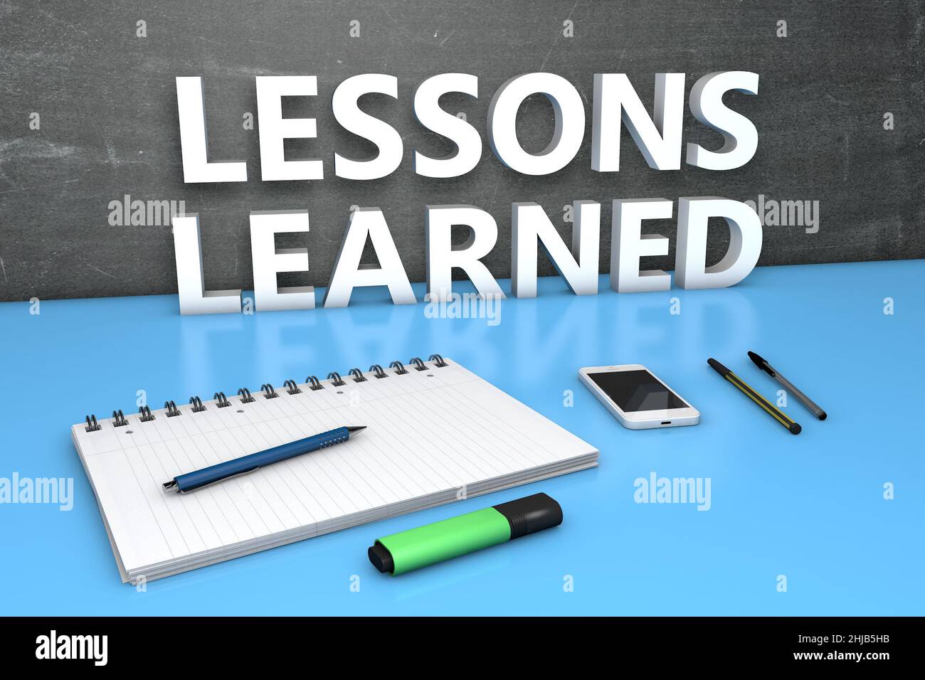 Lessons Learned - text concept with chalkboard, notebook, pens and ...