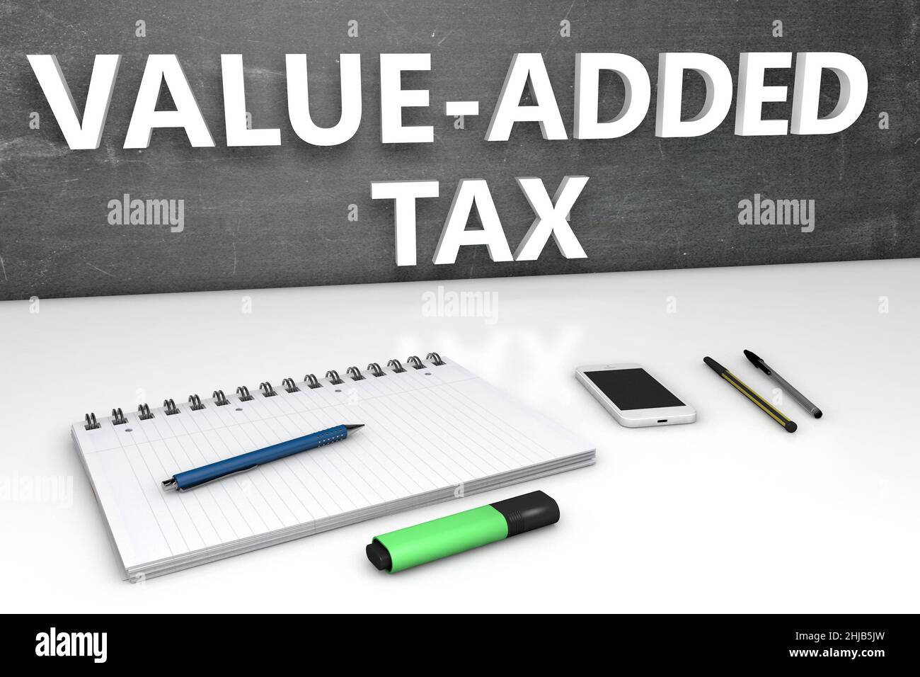 VAT Valueadded Tax text concept with chalkboard, notebook, pens