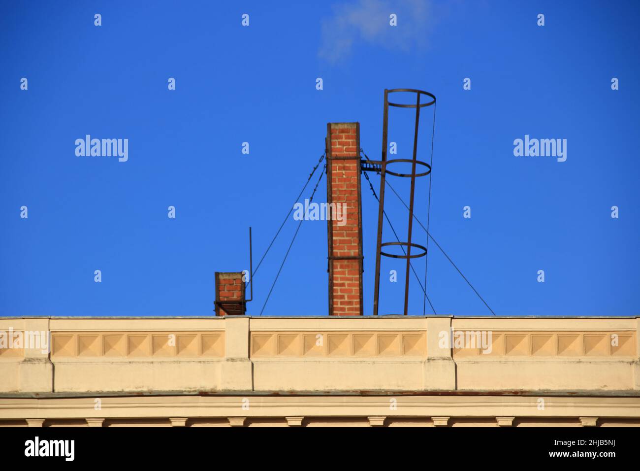 brick fireplace with ascent for the chimney sweep Stock Photo