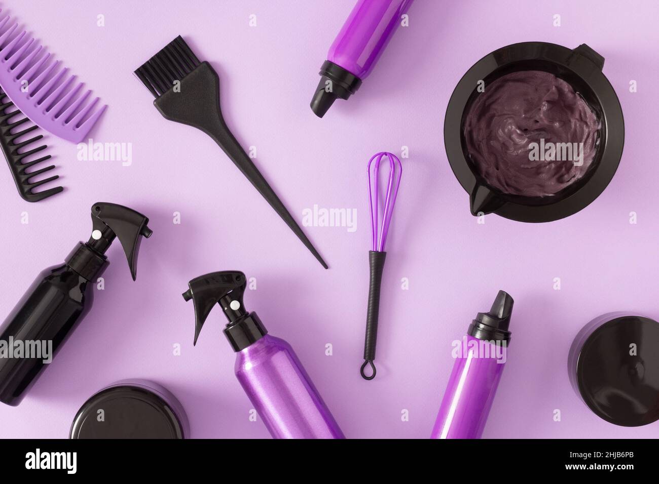 Hair care, styling and coloring products with hair dye tools. Top view