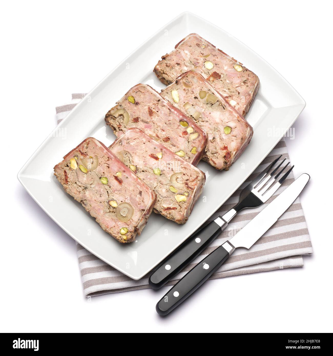 Sliced Traditional French terrine covered with bacon isolated on white
