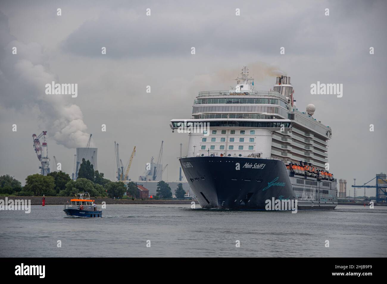 Warnemünde, Germany  23 June 2021,  The 'TUI' cruise ship laying out from the port of Rostock Warnemünde Stock Photo
