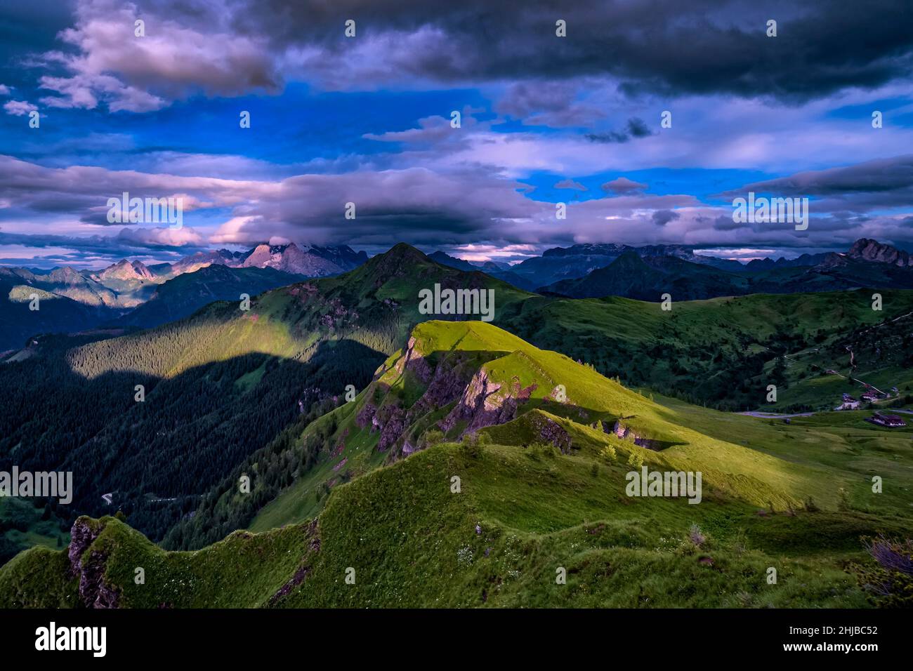 View from Punta di Zonia above Giau Pass, Passo di Giau, to Monte Pore (middle), Marmolada (left) and Sella group (right) at sunrise. Stock Photo