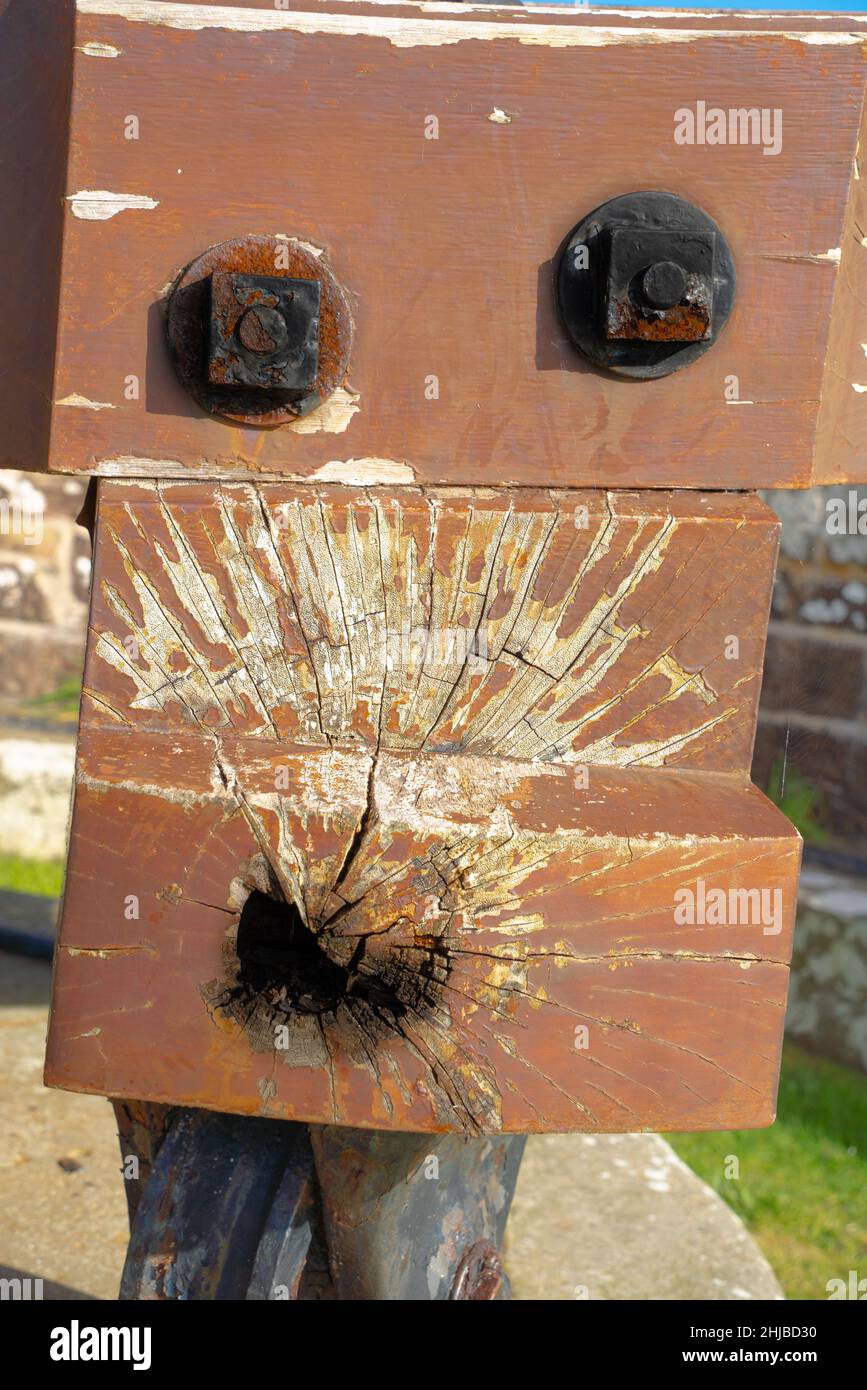 Face pareidolia, face image, Halloween, eye sockets, mouth shape, ugly face, human characteristics, seeing faces, fake faces, gnarled old, wooden bolt Stock Photo