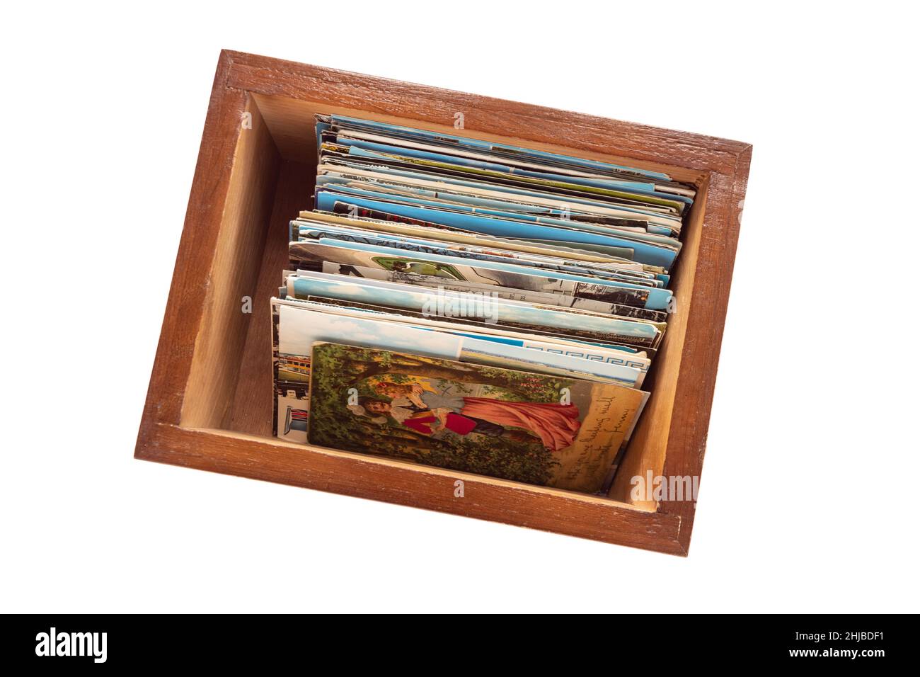 postcard collection - old postcards stored inside wooden box Stock Photo
