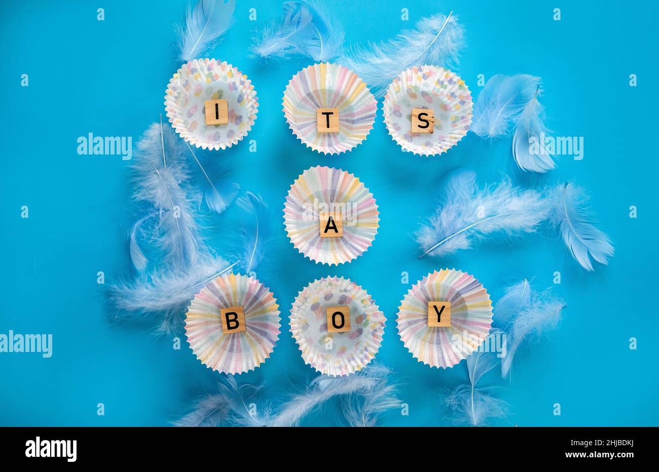 Its a boy text with wooden letters on blue background, Baby boy birth