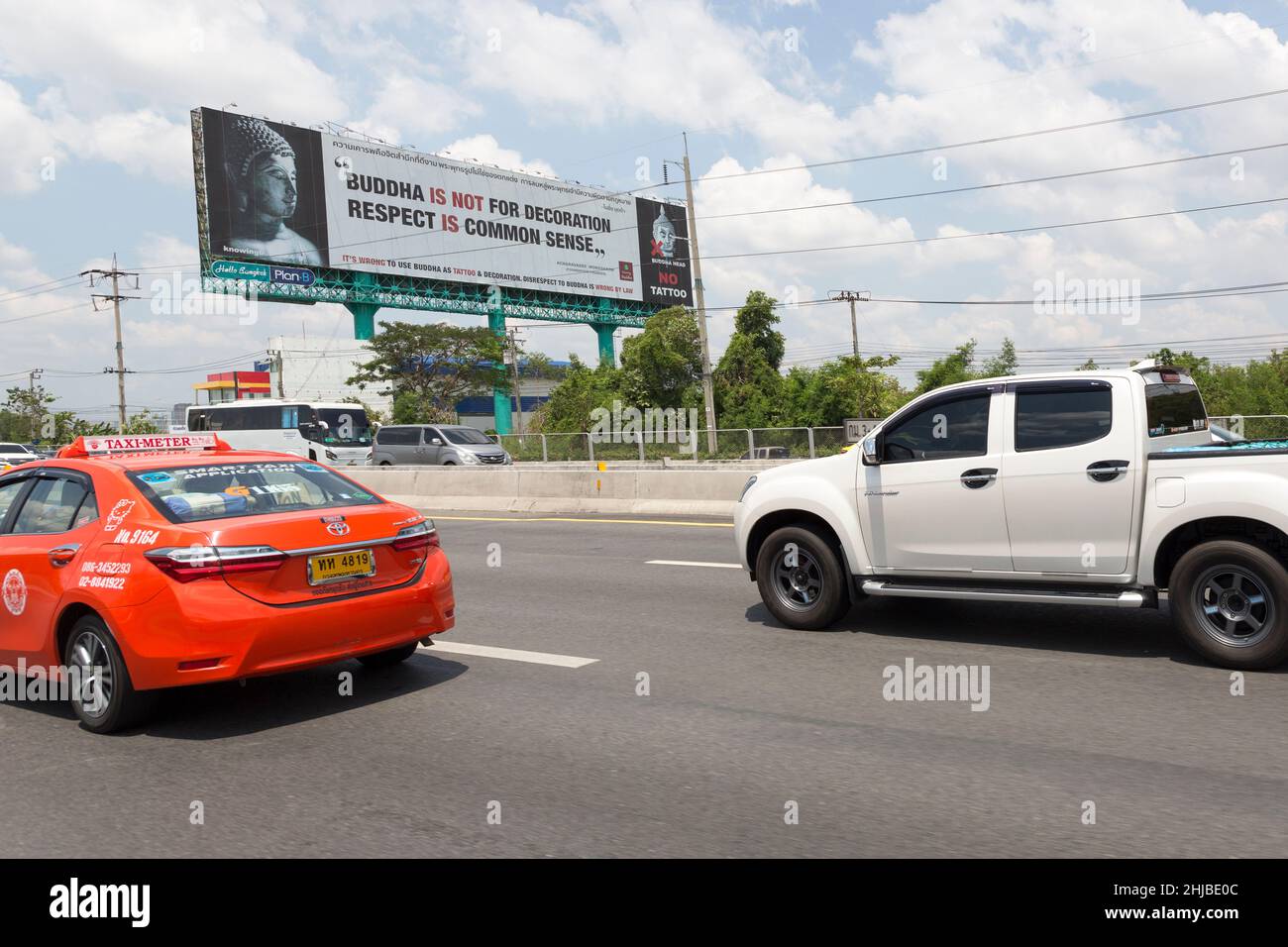 Buddah is not for decoration reminder sign on motorway, Bangkok, Thailand Stock Photo