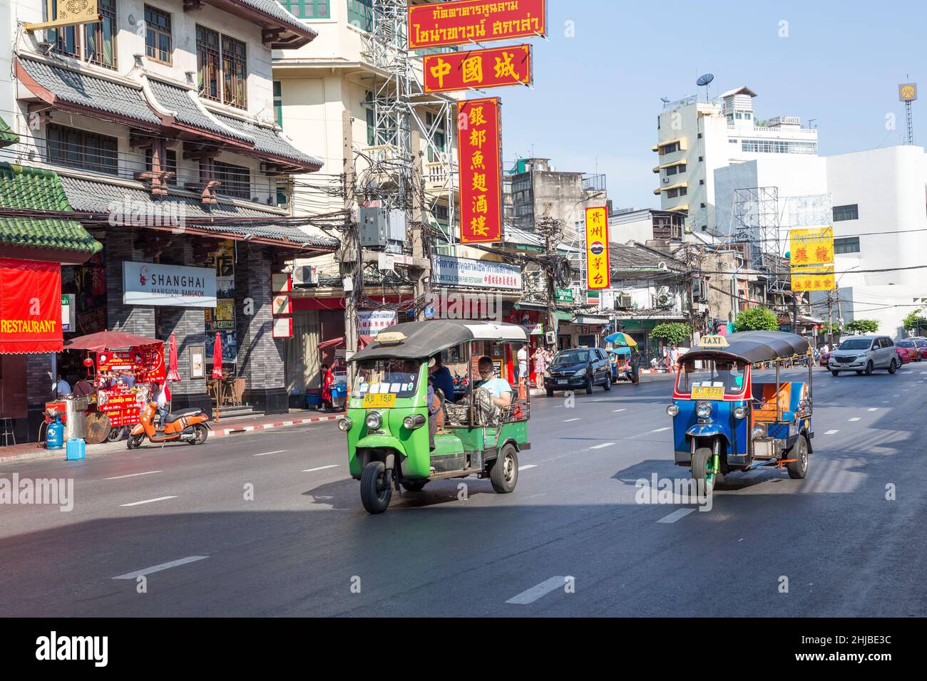 Street scene with tuk tuks, Bangkok, Thailand Stock Photo