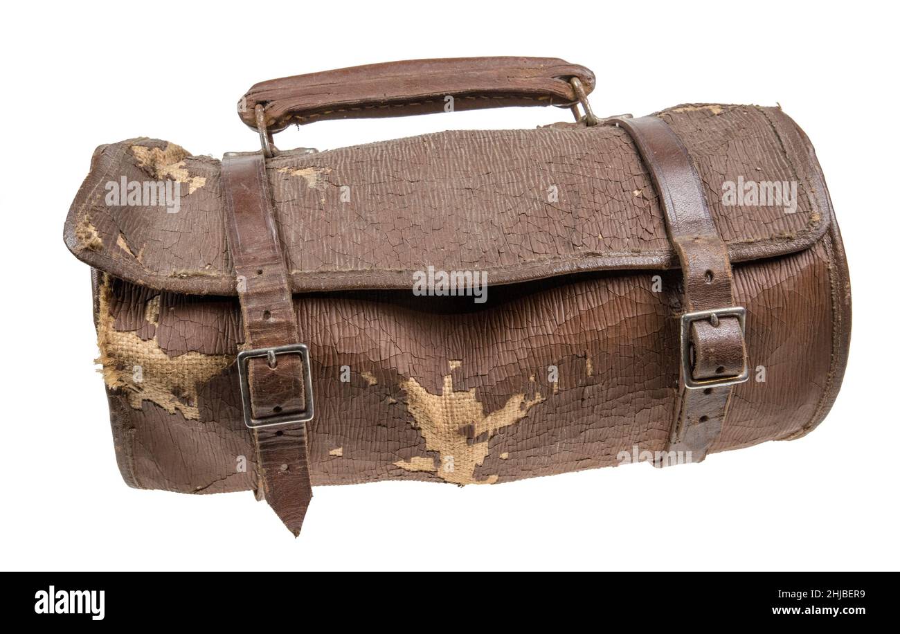 John Calford bowls balls in old leather case falling apart, UK Stock Photo