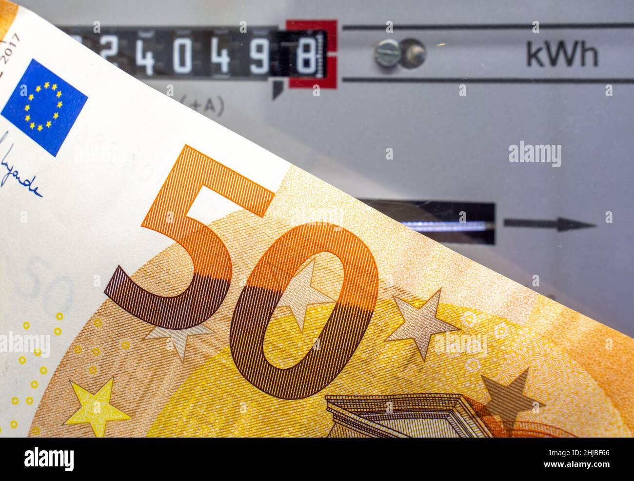 Electricity meter with euro bill icon image Stock Photo