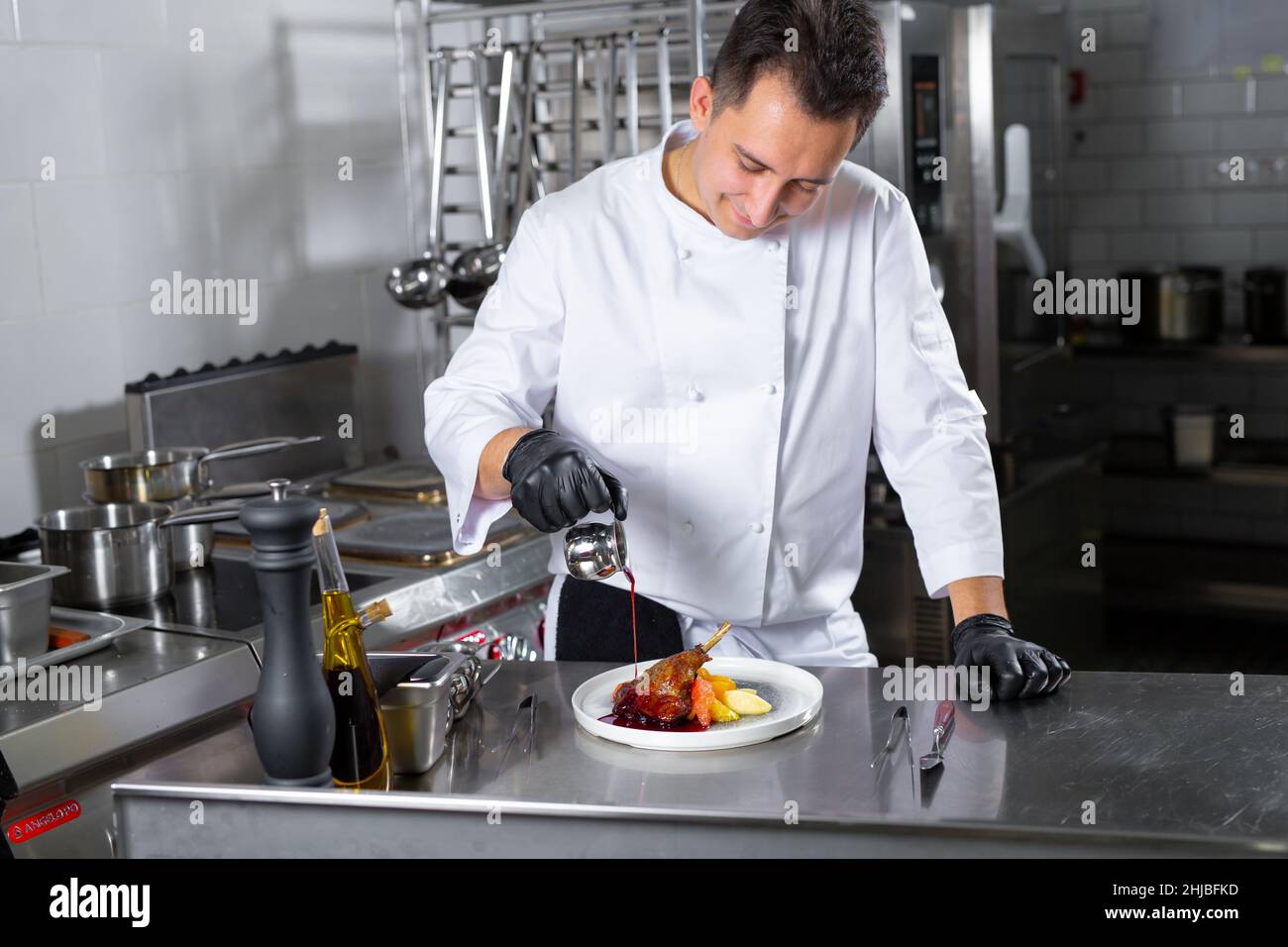 chef preparing ludo in an elite restaurant Stock Photo