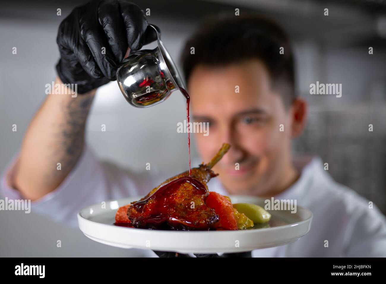 chef preparing ludo in an elite restaurant Stock Photo