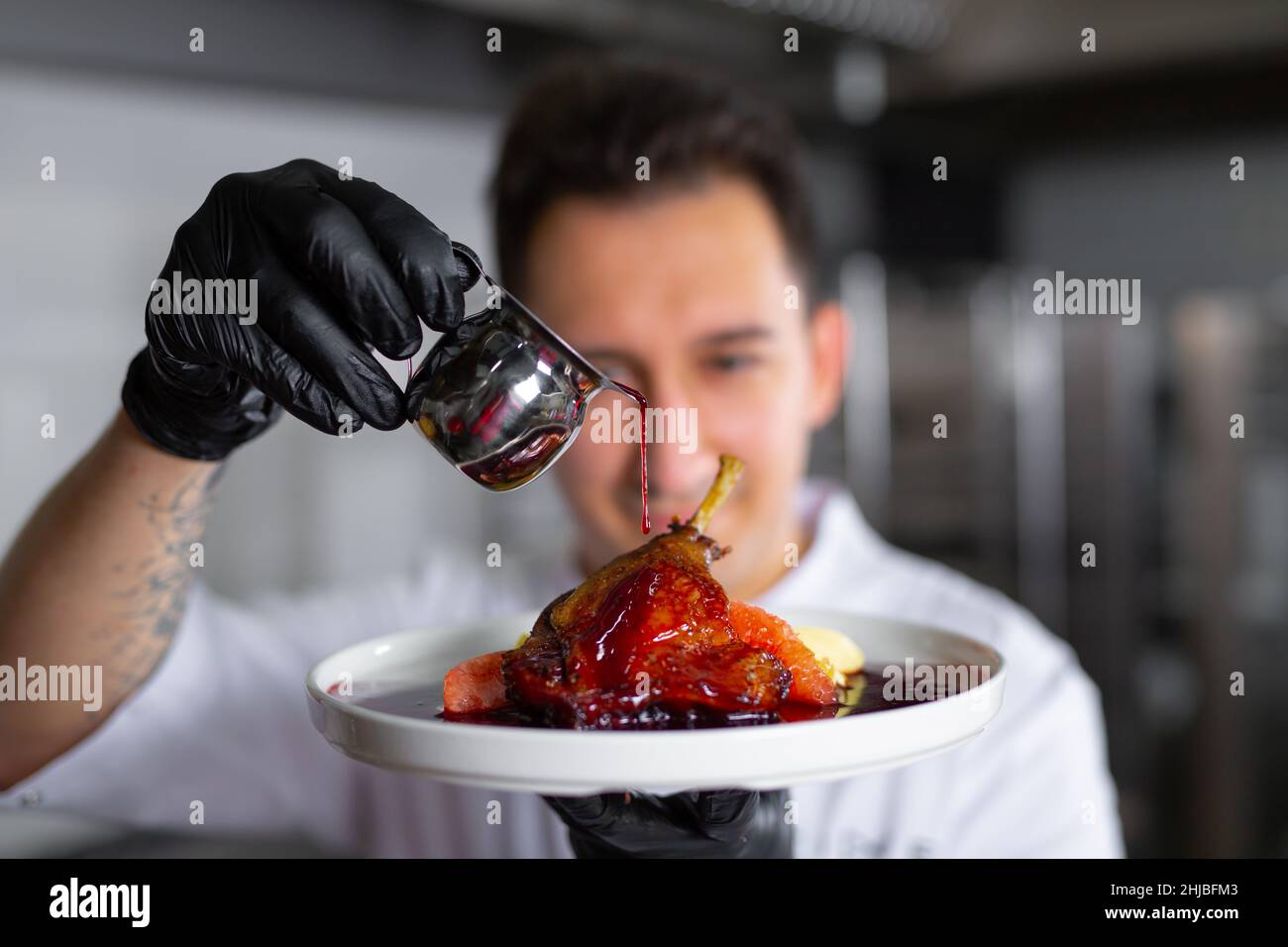 chef preparing ludo in an elite restaurant Stock Photo