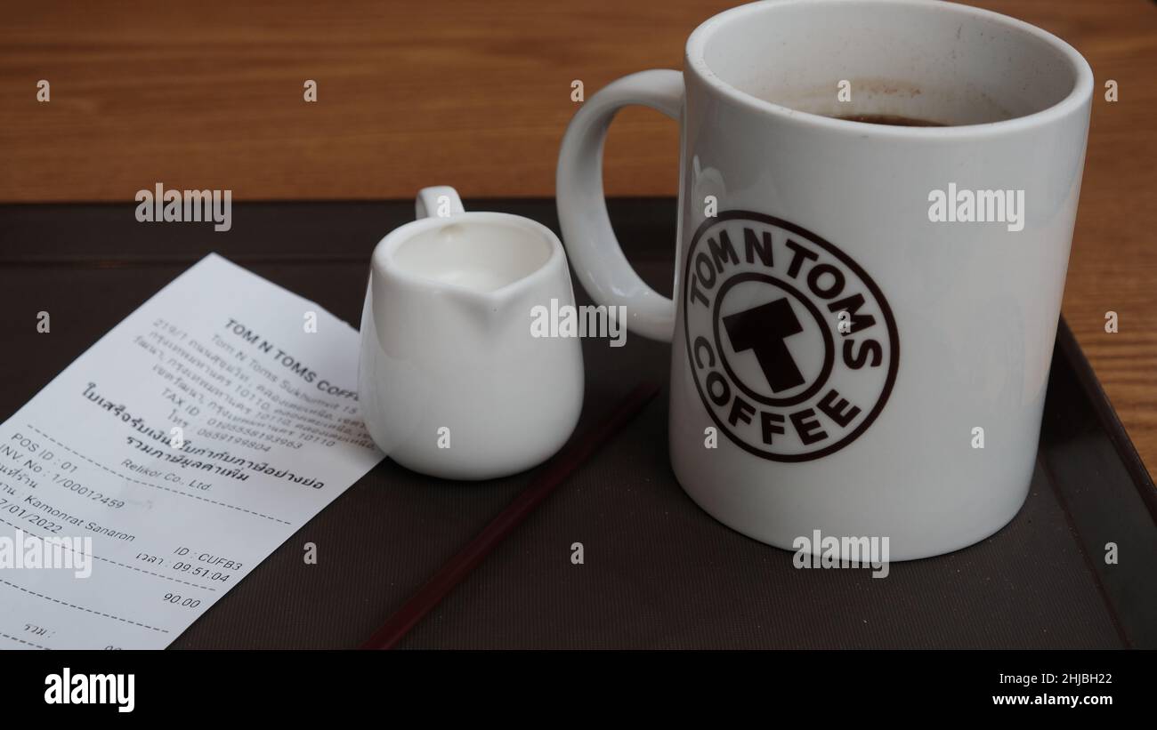 Tom n Toms Ceramic Hot Coffee Cup at Sukhumvit Road Store Khlong Toei Nuea, Watthana Bangkok Thailand Stock Photo