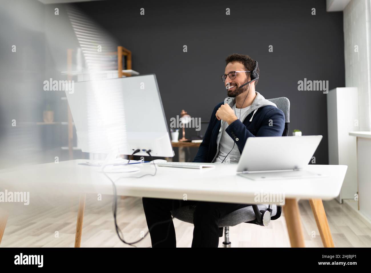 Virtual Business Presentation Or Videoconferencing On Computer Stock Photo