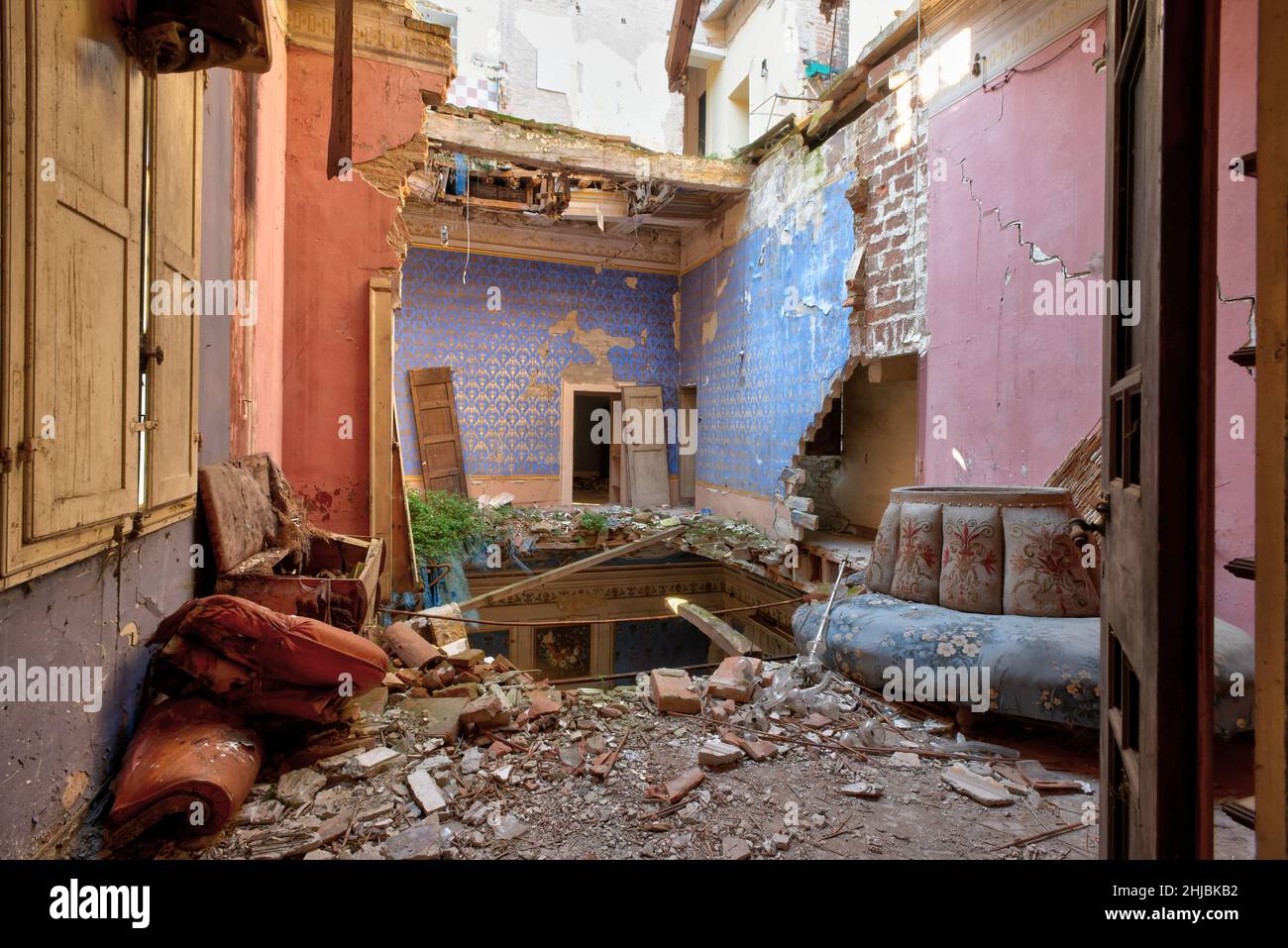 September 2021, Italy. Rooms of a castle heavily damaged by an earthquake. Urbex in northern Italy Stock Photo