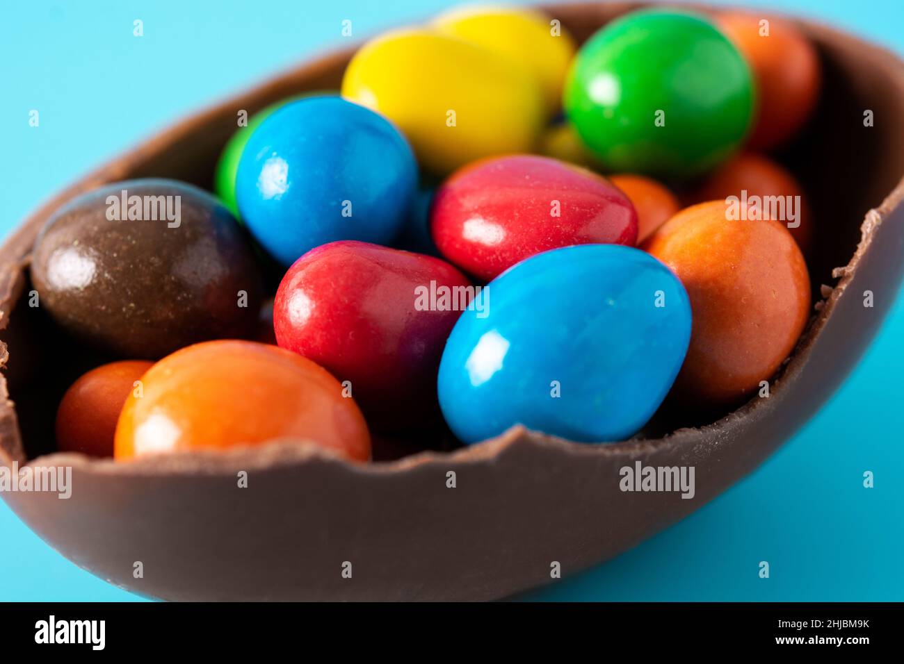 Colorful Easter eggs on blue background Stock Photo