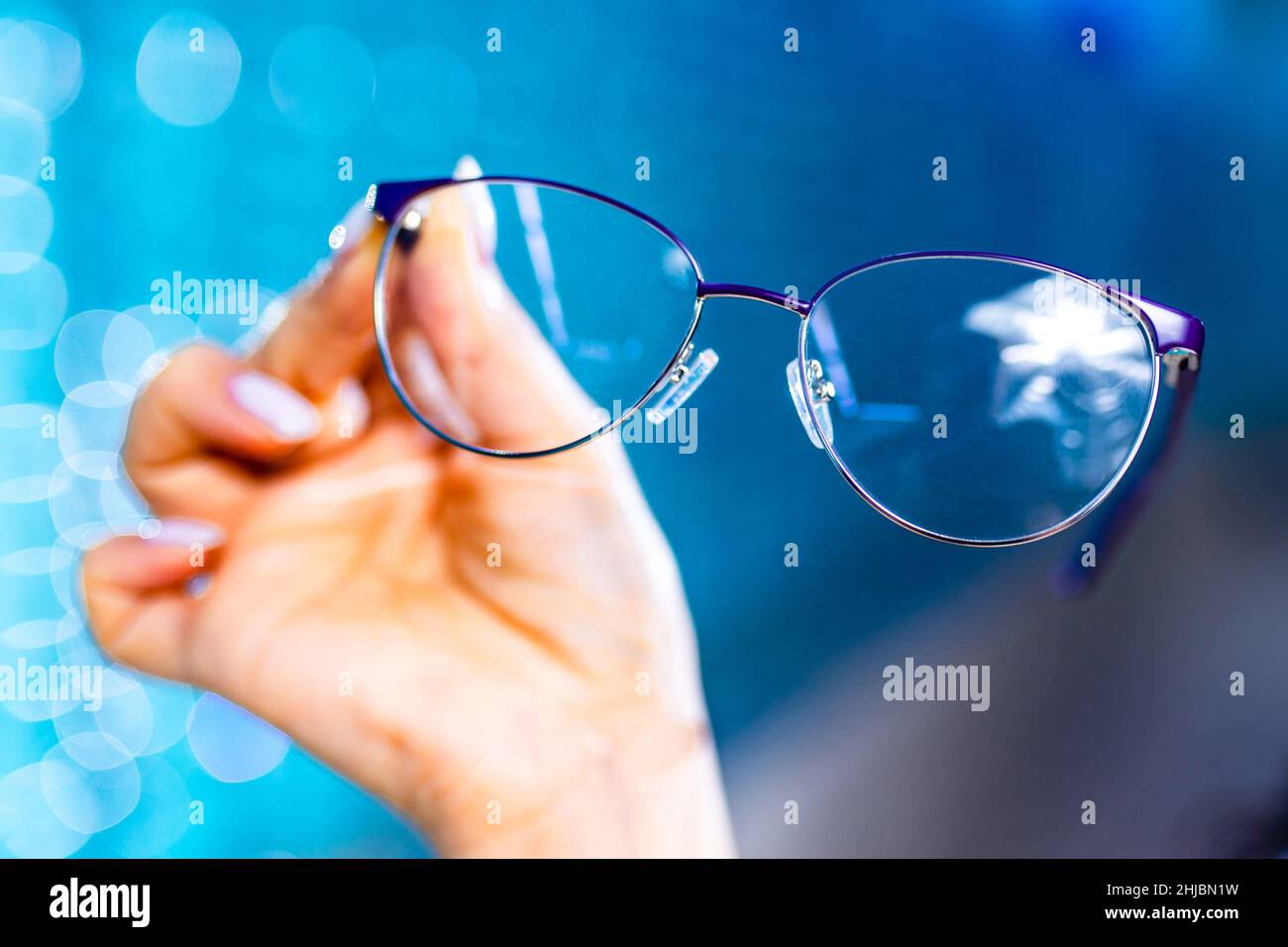 stand with glasses in the store of optics copyspace Stock Photo