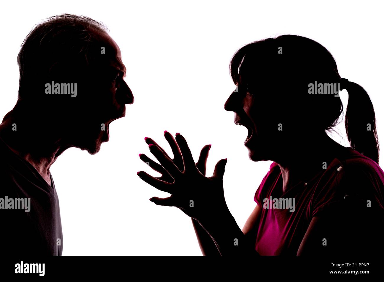 Silhouette of couple having conflict Stock Photo - Alamy